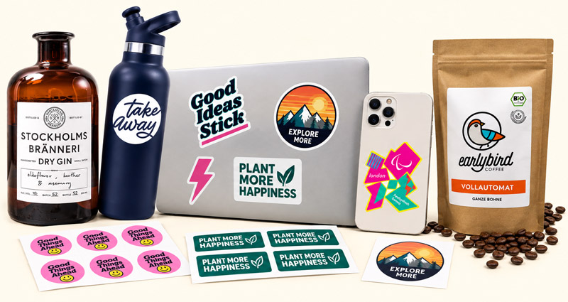 White vinyl stickers on bottles, packaging, a laptop and phone